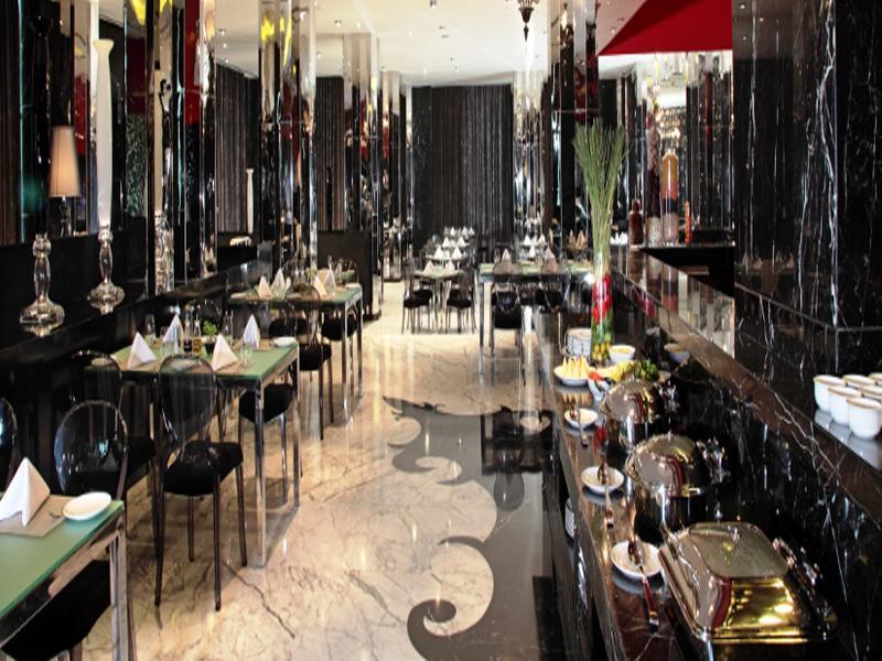 Radisson Blu Hotel New Delhi Paschim Vihar מראה חיצוני תמונה The restaurant